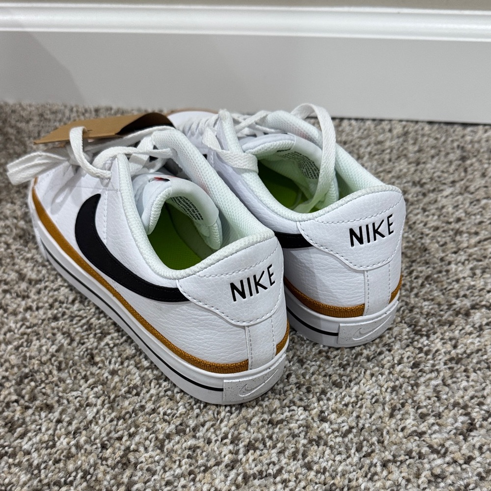 Nike White Low-Top Sneakers with Black Swoosh and Brown Trim - Picture 3 of 3